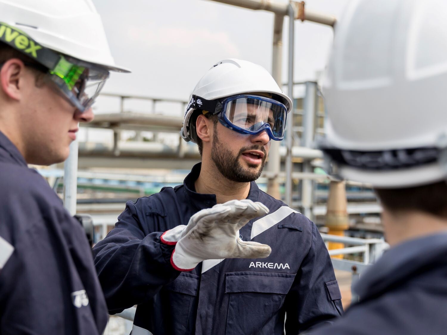 two workers are shaking hands