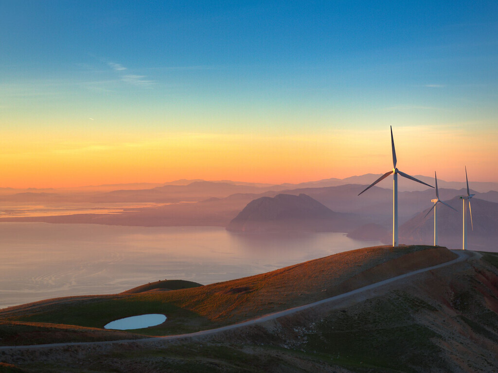 Wind turbines at sunset