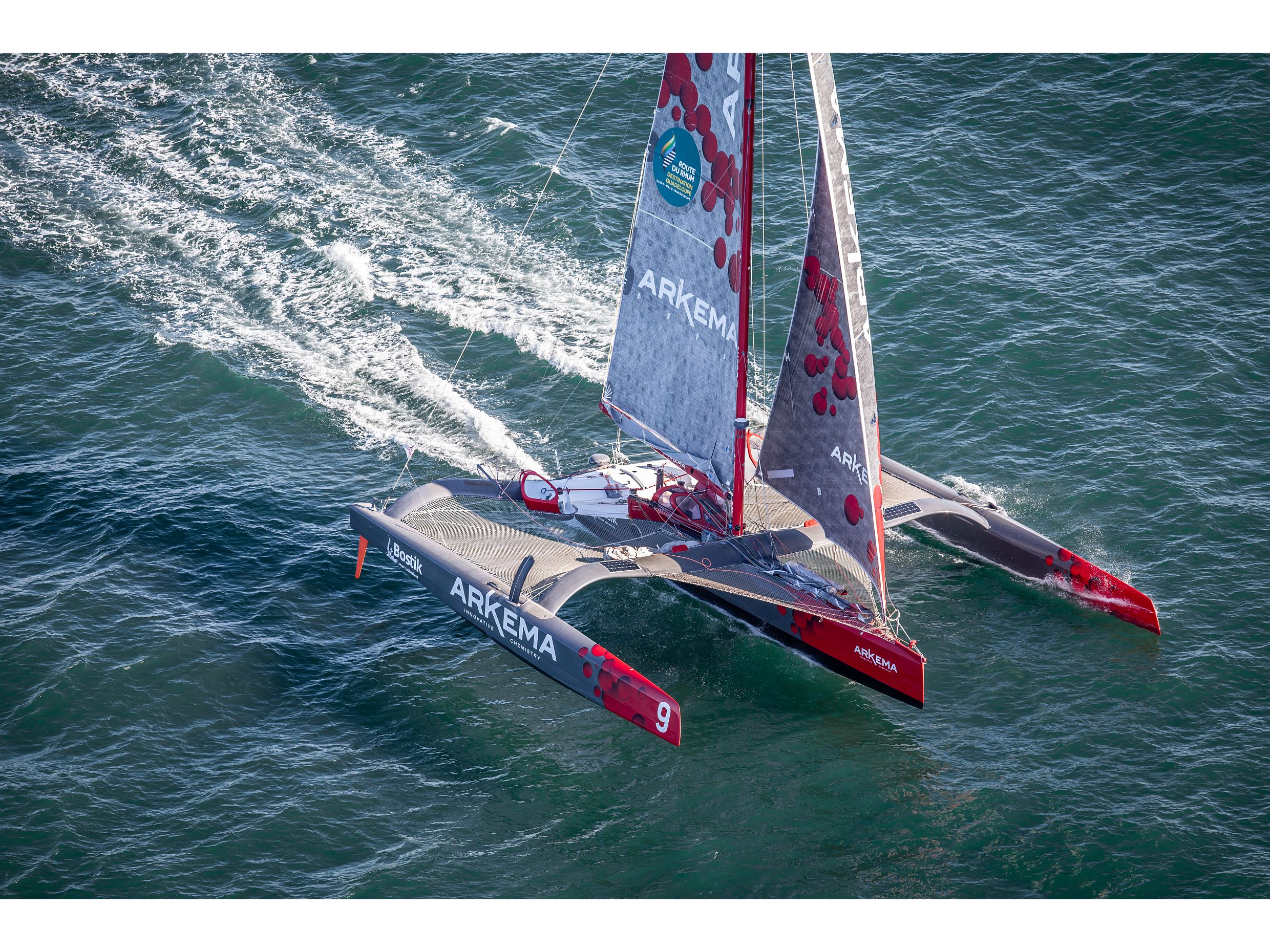  Vue aérienne par hélicoptère du trimaran multi50 Arkema, à l'occasion d'une sortie en mer avec Lalou Roucayrol et Quentin Vlamynck à bord - Préparation à la Route du Rhum - Destination Guadeloupe 2018