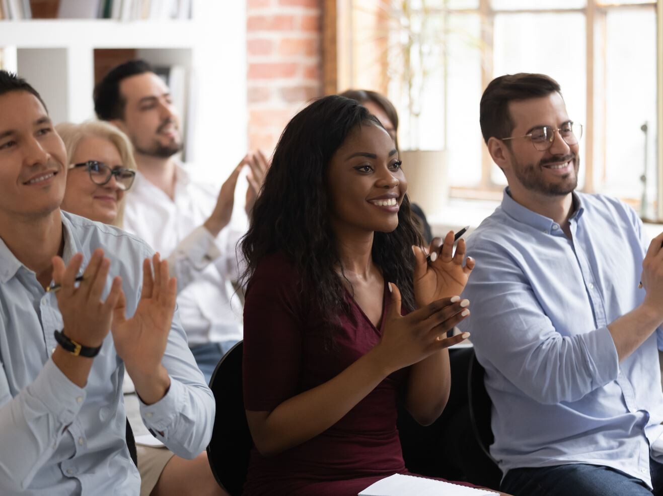 Group of people clapping