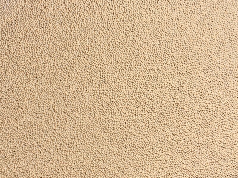 Detailed view of a bed of molecular sieves in bead form