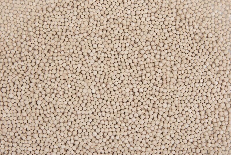 Beige bead-shaped molecular sieves