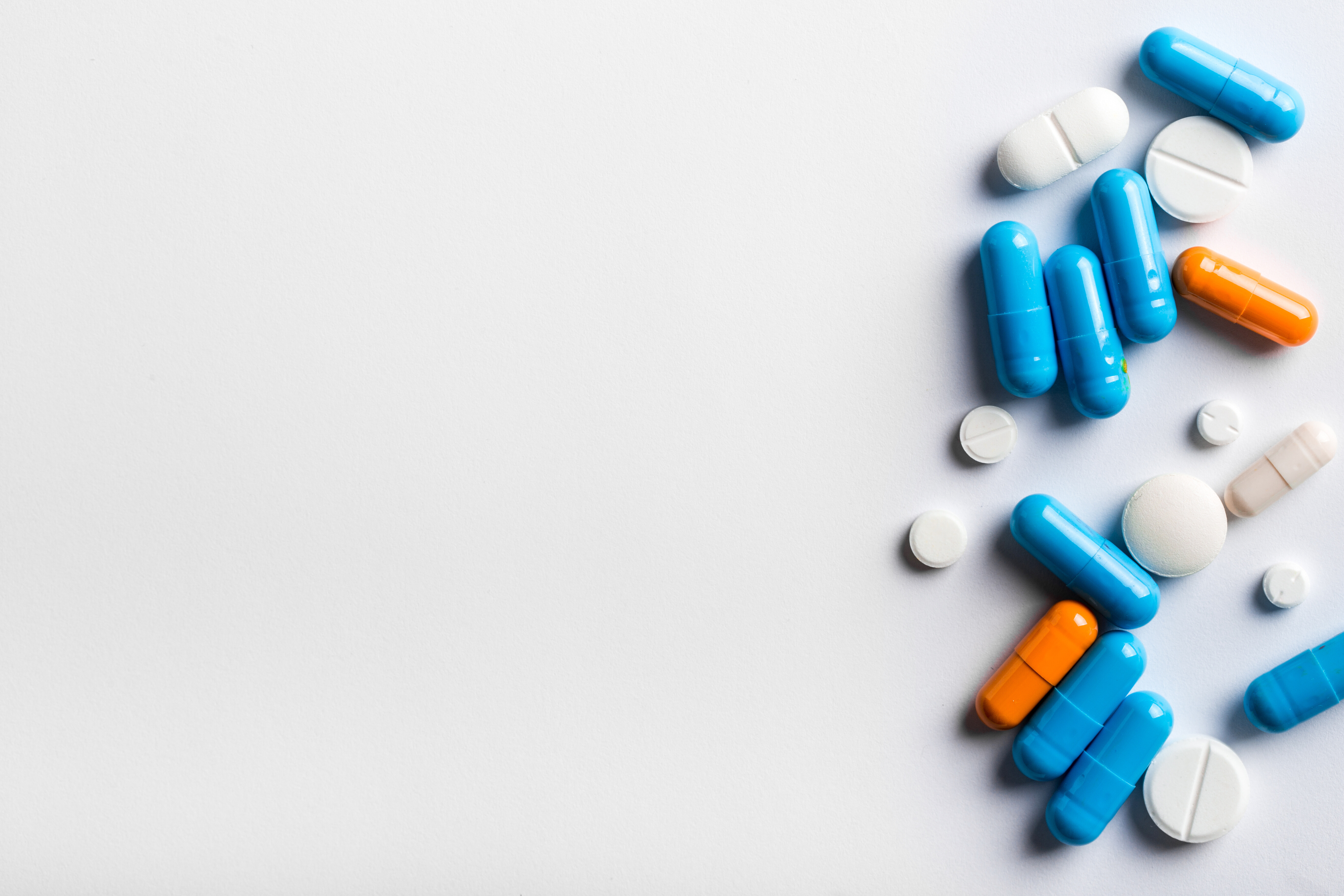 different medicines on a white table