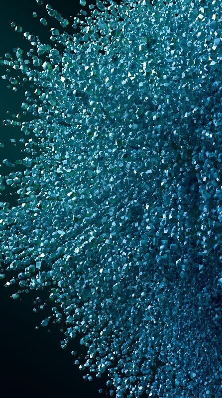 Explosion de petits granulés en dégradé de bleu